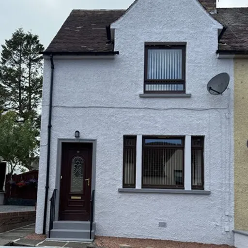 Front of the house and garage after painting