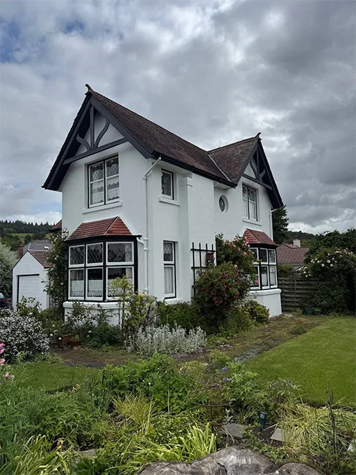 Family home exterior repaint with neutral colour scheme