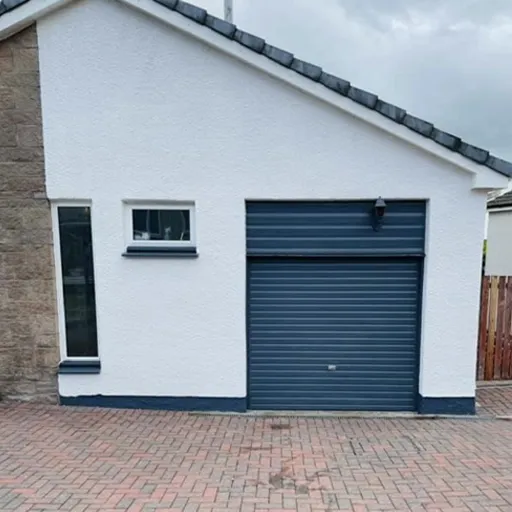 Side of the house and garage after painting
